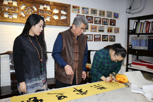 王勝利為廣西“百味螺”題詞 助力愛心企業新發展